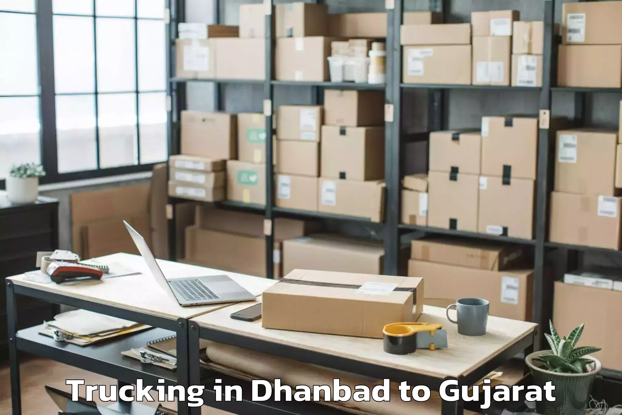 Easy Dhanbad to Navrangpura Trucking Booking